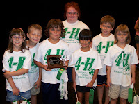 The Crawfordsville Clover Kids showed up as the 4-H Spirit Squad who shared the 4-H Pledge and gave some 4-H cheers.  The judge awarded them with the Judge’s Choice trophy.  Photo Courtesy of The Washington County Extension.