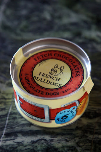 Well, look at this!  A little tin with a picture of a French bulldog!  I wonder what's inside?