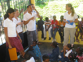 Johan leading song time for the older classes.