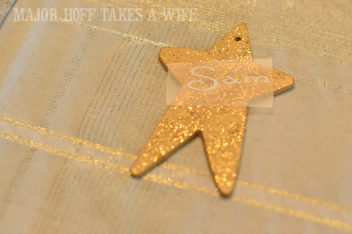Transfering name onto ornament using transfer tape. Looking for homemade Christmas gifts? Look no further than these homemade Christmas ornaments. Use them as tree decorations, to grace your holiday table, or for fun tags to gifts! The ideas and endless and your friends and family will love these glittery stars personalized just for them! Transfering name onto ornament using transfer tape. Looking for homemade Christmas gifts? Look no further than these homemade Christmas ornaments. Use them as tree decorations, to grace your holiday table, or for fun tags to gifts! The ideas and endless and your friends and family will love these glittery stars personalized just for them!
