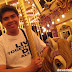 Hubby riding the pony at the Disneyland Carousel