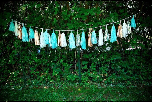 I just love the way they look against the green. After the party, I hung them in the boys' room as a memento.