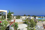 Фото 7 Coral Beach Rotana Resort