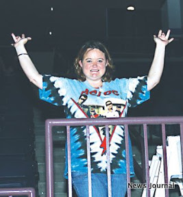 Fan with hands in air 2x.jpg