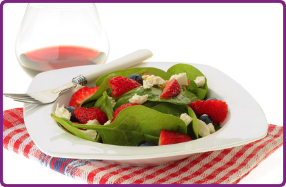 Pickled Strawberries with Tender Greens and Goat Cheese