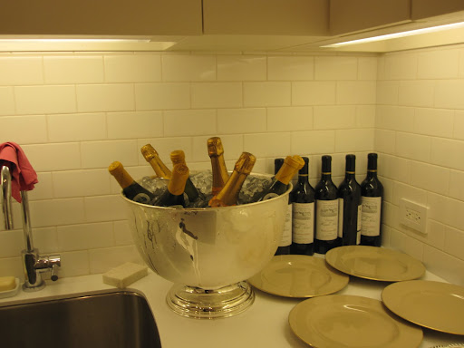 The champagne is chilling in the kitchen.
