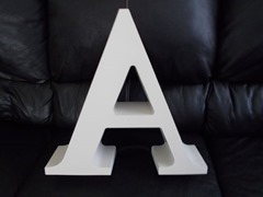White vintage plastic capital letter “A"