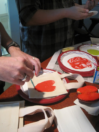 Scott used a paintbrush to transform his apple stamp into a heart shape. Scott used a paintbrush to transform his apple stamp into a heart shape.