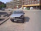 Scrap vehicle in the street Scrap vehicle in the street