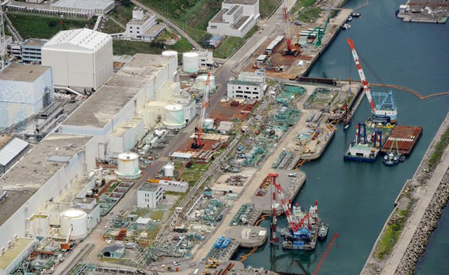 Aerial view of Fukushima nuclear plant. Japan's Nuclear Regulation Authority said on 10 July 2013 it strongly suspects highly radioactive water at the Fukushima No. 1 nuclear plant is seeping into the ground and contaminating the Pacific Ocean. Photo: KYODO