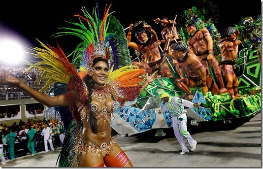 Performers from the Mocidade Independente de Padre Miguel samba school join in the celebrations at the Sambadrome in Rio de Janeiro. (Silvia Izquierdo/Associated Press)