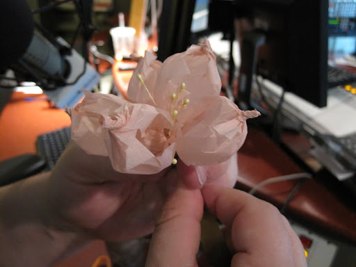 Chris made a bubble petal flower by shaping small sheets of tissue paper over a ball, then twisting the petals together onto a wire stem.