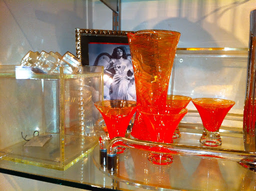 The color of this glass bar set is amazing. It reminds me of a blood orange.