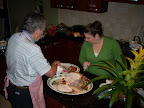 Laura makes sure Dad is doing it right...