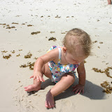 Finally at the end of the vacation she got down in the sand!