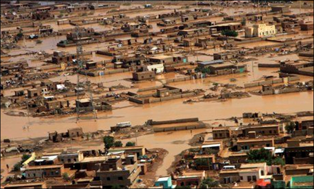 Aerial view of the area affected by floods caused by heavy rains in Khartoum, Sudan, in August 2013. Massive floods in Sudan, forced more than 250,000 people from their homes. The region around the capital, Khartoum, was particularly badly hit, with at least 15,000 homes destroyed and thousands of others damaged. Photo: Stringer / Reuters