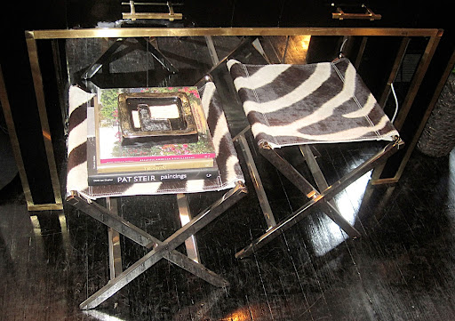 As everyone knows I love pairs.  These zebra print chrome stools are no exception.