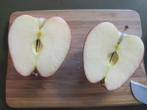 Step one: Slice the apples in half. Use paper towels to dab away excess moisture on the cut surface before you dip into paint. Step one: Slice the apples in half. Use paper towels to dab away excess moisture on the cut surface before you dip into paint.