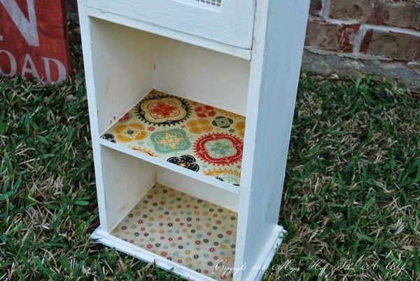 Decorate shelves with scrapbook paper and modge podge.jpg Decorate shelves with scrapbook paper and modge podge