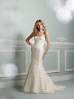 I am loving this romantic strapless gown by James Clifford. I am loving this romantic strapless gown by James Clifford.