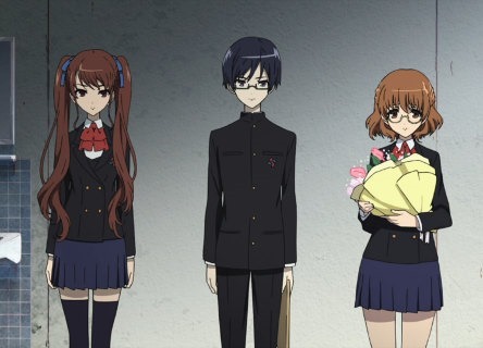 Three students stand side by side facing forward, in impeccable but emotionless posture; a girl, a boy, and another girl holding a bouquet of pink flowers