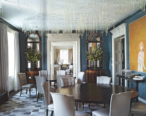 This lighting design by Sharon Louden is truly a work of art. I like how Kleinberg opted for an unconventional table arrangement with two round tables.
