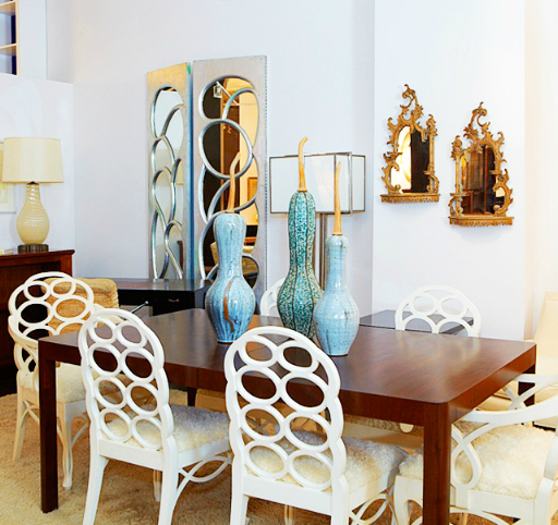 Quirky blue gourd vases glamorize a clean wooden table. In turn, its hard edges allow all the curves in this image to really shine. Quirky blue gourd vases glamorize a clean wooden table. In turn, its hard edges allow all the curves in this image to really shine.