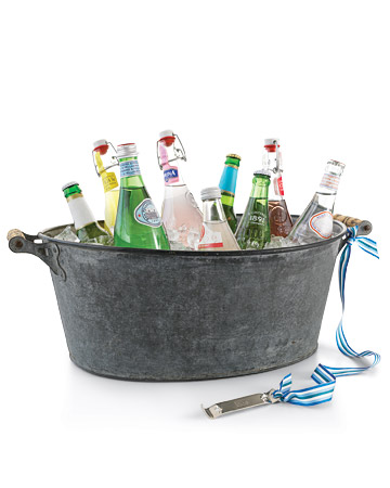 For large bottles or big crowds, you'll need a rustic and spacious ice bucket like this one. Attaching a bottle opener with a ribbon is a great idea as well.
(marthastewart.com) For large bottles or big crowds, you'll need a rustic and spacious ice bucket like this one. Attaching a bottle opener with a ribbon is a great idea as well.
(marthastewart.com)