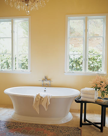 I like the unexpected use of an oriental carpet and chandelier.(marthastewart.com)