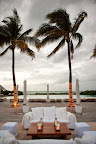 White lounge furniture offered cozy areas for guests to relax as the evening progressed. White lounge furniture offered cozy areas for guests to relax as the evening progressed.