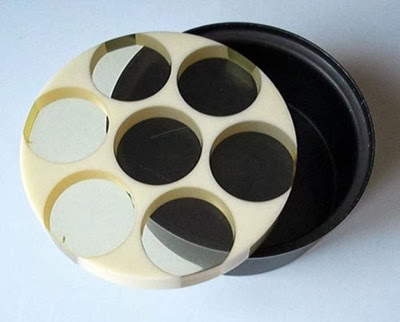 Enzo Mari round container offset lid