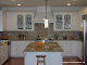 Custom cabinets with colored and various textured clear glass.
