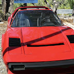 L'authentique fausse Ferrari de Magnum !!! Higgins était donc pas si riche que ça. Un mythe s'éffondre. Et la moustache, elle était vraie la moustache ?