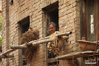 Old lady looking out of the window