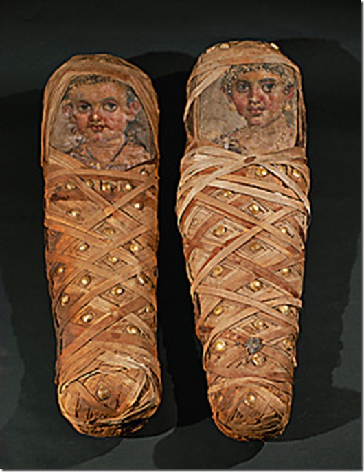 Funeral-portraits of the children of Aline             <br />(see 08-01-10/68),                                     <br />from Hawara, Fayum Osasis, Egypt.                      <br />Painted canvas (about 50 CE)                           <br />Inv. 11 412, 11 413                                    <br />