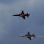 The two solo pilots performing the flat mirror figure