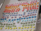 Elizabeth cut out each dot using the back of a piping tip.