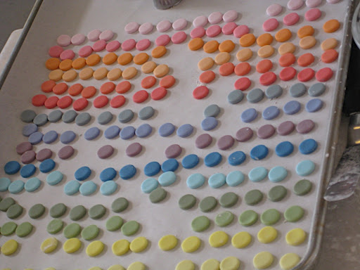 Elizabeth cut out each dot using the back of a piping tip.