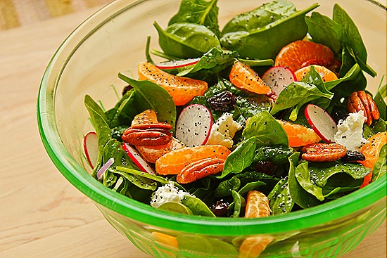 Spinach Salad with Clementines, Radishes, Pecans, Onions, Raisins, Goat Cheese & Poppy Seed Vinaigrette