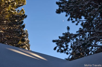 moon in the blue blue sky at five below zero in Rocky Point