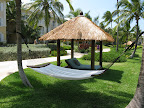 Hammocks and mini lounge huts are scattered across the Sandals Emerald By Resort. Great a little R&R anytime.