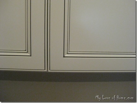 Soft white cabinet with chocolate glaze