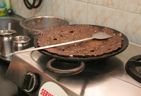 Cook on a skillet (what's referred to as a tawa in India) about 4 minutes per side.