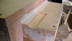 This groove is where the hinge bracket attaches on the frame. Not necessary, but just for a better fit.