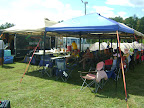 Bubbas Camping Service.  This guys takes care of tents and amenities for campers. Pay Bubba, Pack your bags, and he does all the rest.  Cycle NC 2011 - Henderson YMCA Campground