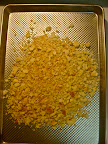 Toast breadcrumbs in a 300 degree oven until they're slightly browned and crunchy.