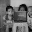 Shanghai - Marché poisson - les 3 enfants devant l'écran