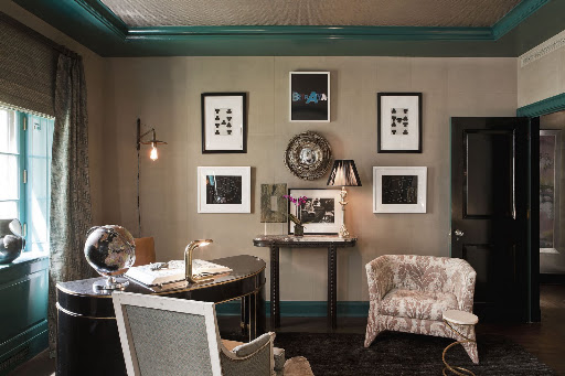 What a chic study. I love the brass and chrome touches paired with the natural wallcovering. (Jeff Lincoln Interiors, Inc.)