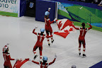 Team Canada celebrating gold in the men's 5000m relay
