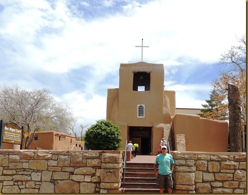 Vic standing at the stone wall of San Miguel Mission